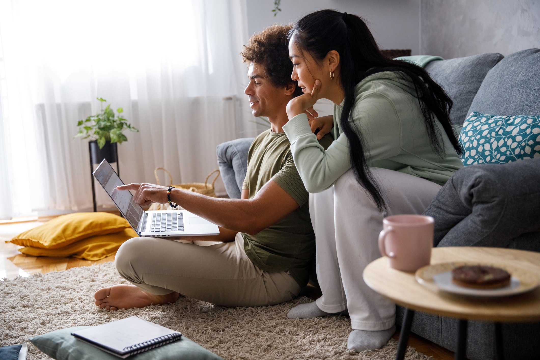Couple Looking At Computer