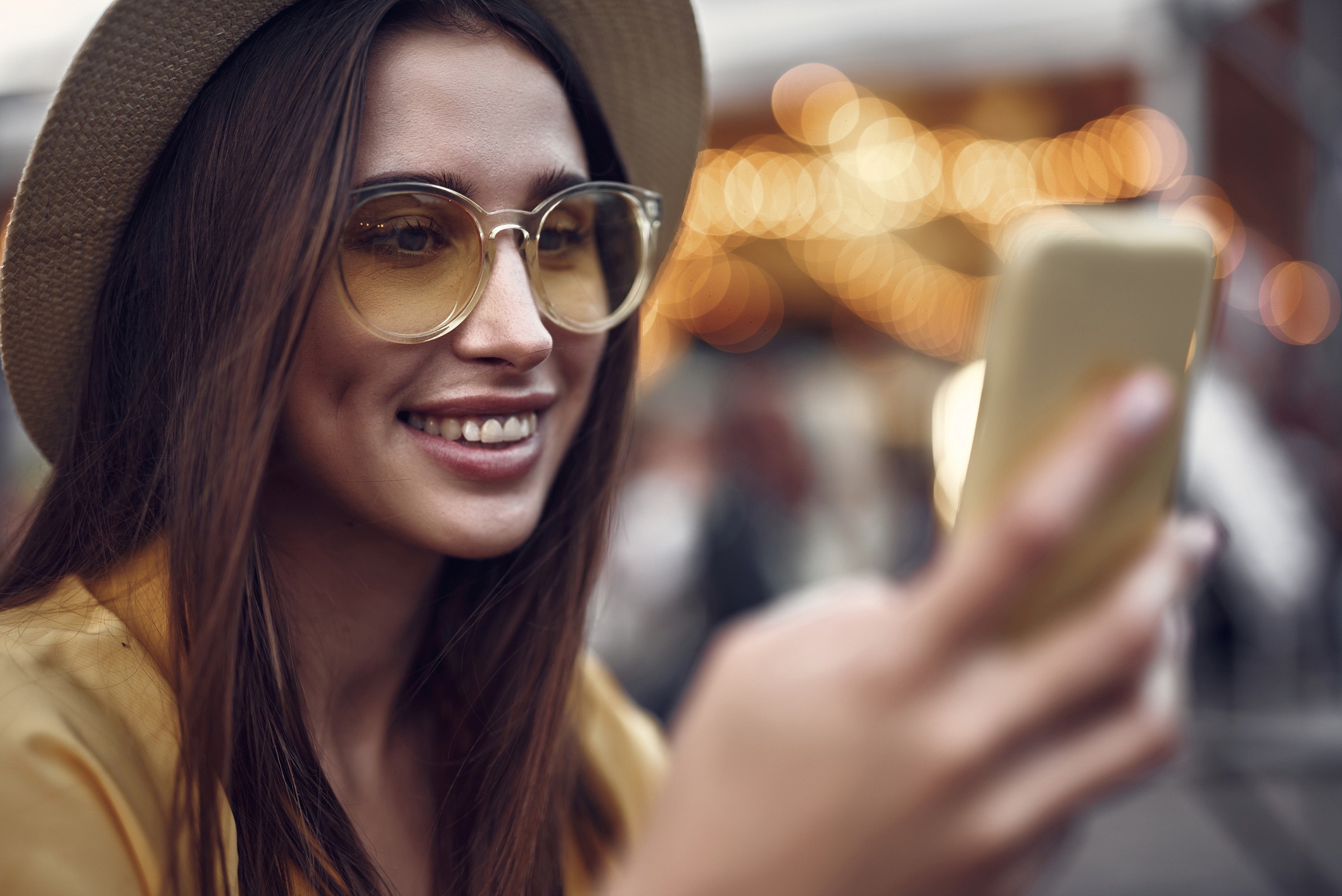 Woman Sunglasses And Phone