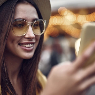 Woman Sunglasses And Phone