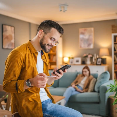 Man With Phone On Table